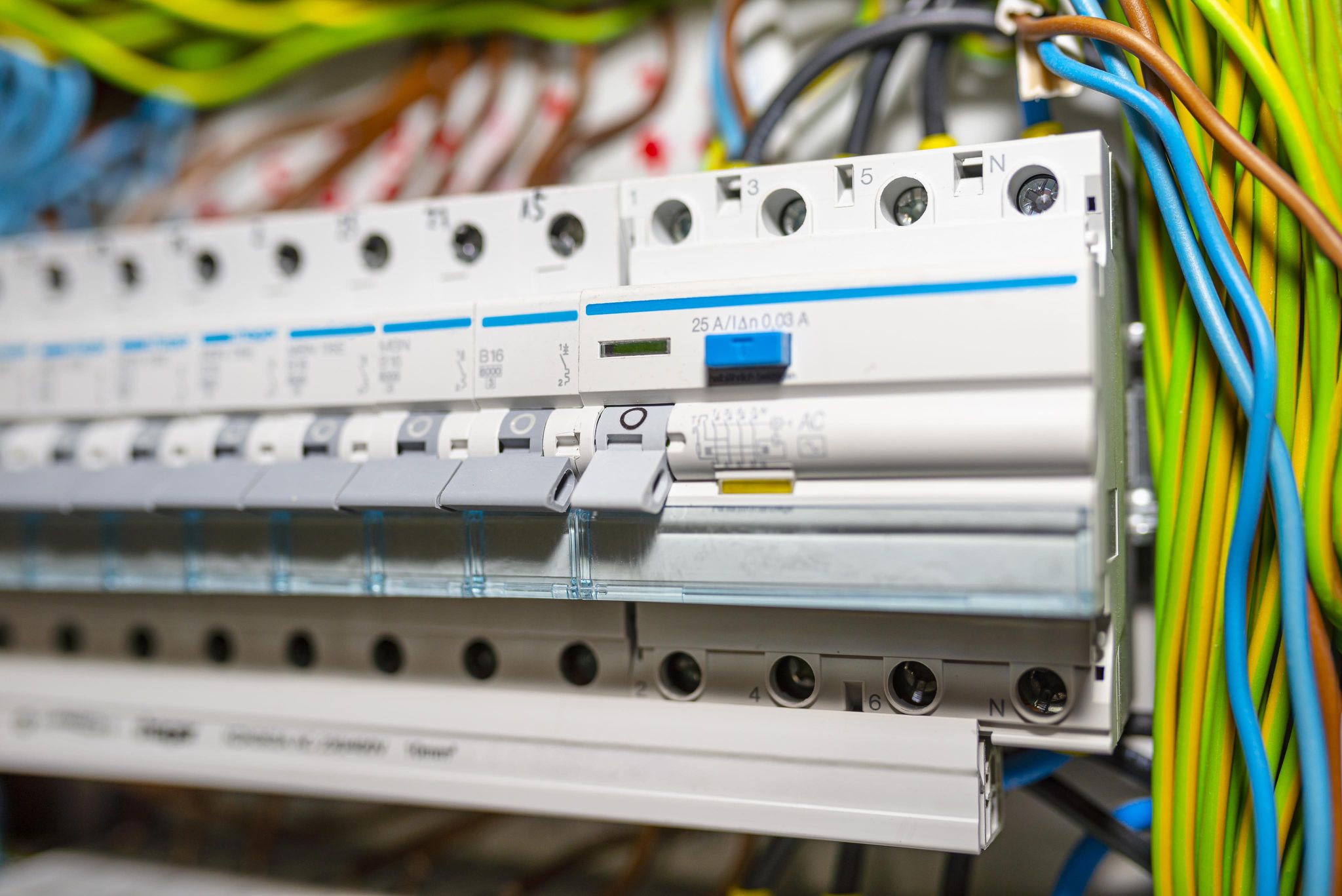 Consumer unit fuse board with colour-coded wiring